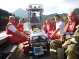 Symbolfoto FF Altaussee - Verletztenbergung in der Seewiese mit Rot Kreuz
